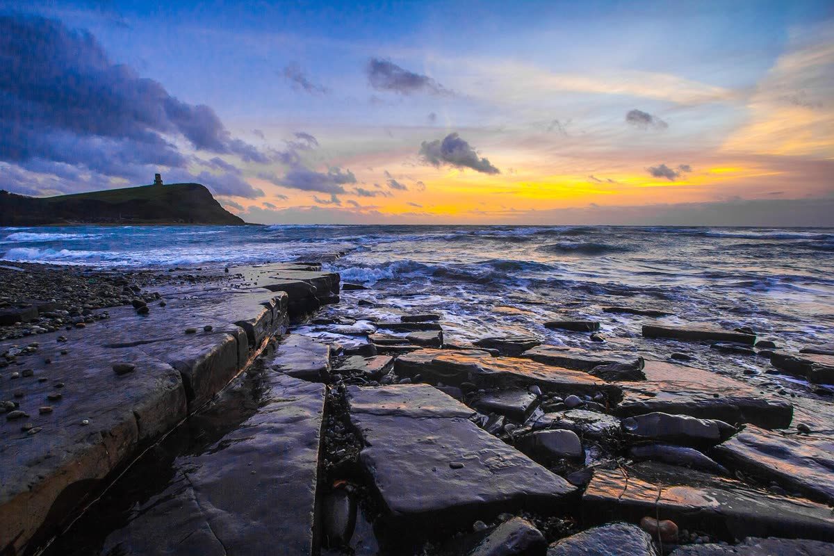 礁石日落 · Sunset over the Rocks